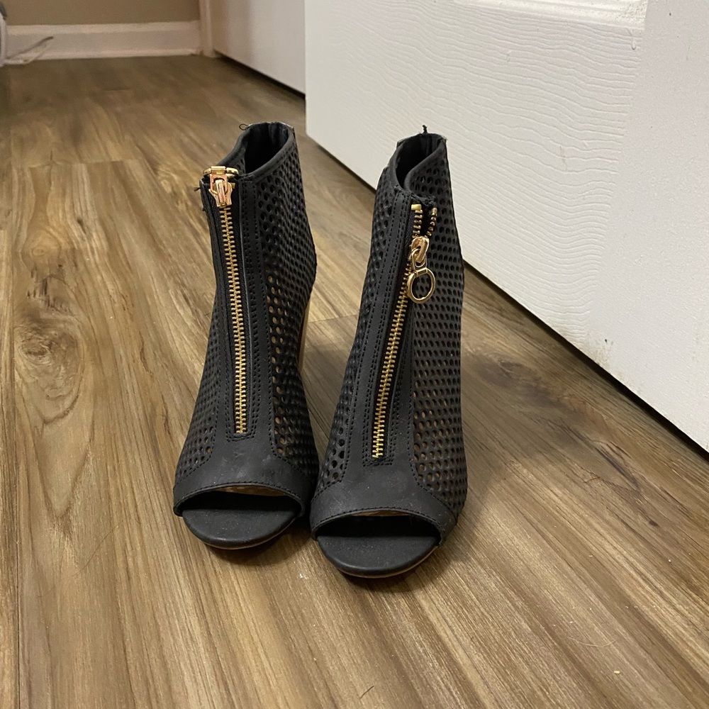 Lightly used black heeled sandals